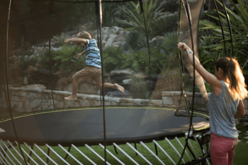 Trampolines should always be placed on level and softer surfaces.