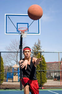 Man passing basketball