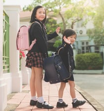 Kids in Japan bring all their school supplies in a hard-sided backpack called a randoseru on the first day.