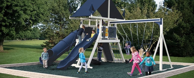 Children playing on a vinyl commercial swingset SK12 Mountain CLimber